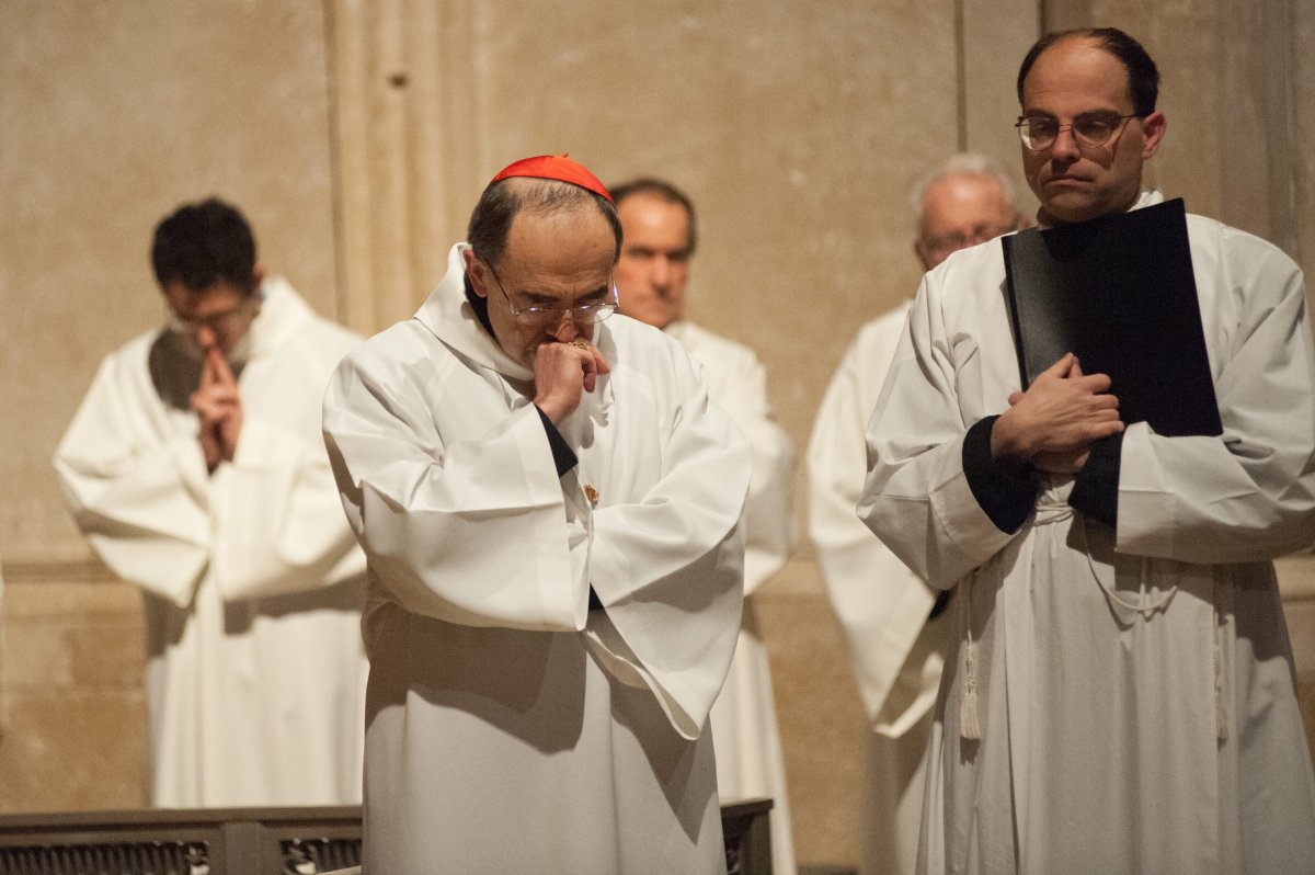 Roman Catholic Cardinal, Archbishop of Lyon, Philippe Barbarin takes part in a Good Friday mass on March 25, 2016 in Saint-Jean cathedral in Lyon, central eastern France. Barbarin, accused of covering up the sexual abuse of children by priests apologised to victims during a mass on March 23, according to the website of his diocese. 