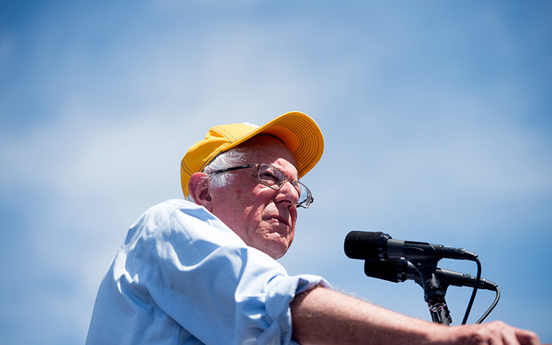 Democratic presidential candidate Sen. Bernie Sanders, I-Vt., speaks during a campaign rally at the Cubberley Community Center in Palo Alto, Calif. With the end of the primaries looming, Bernie Sanders is focused on victory in California yet offering signals about what he will do next to shape the party's platform at the convention, help down-ballot Democrats and defeat Donald Trump.  