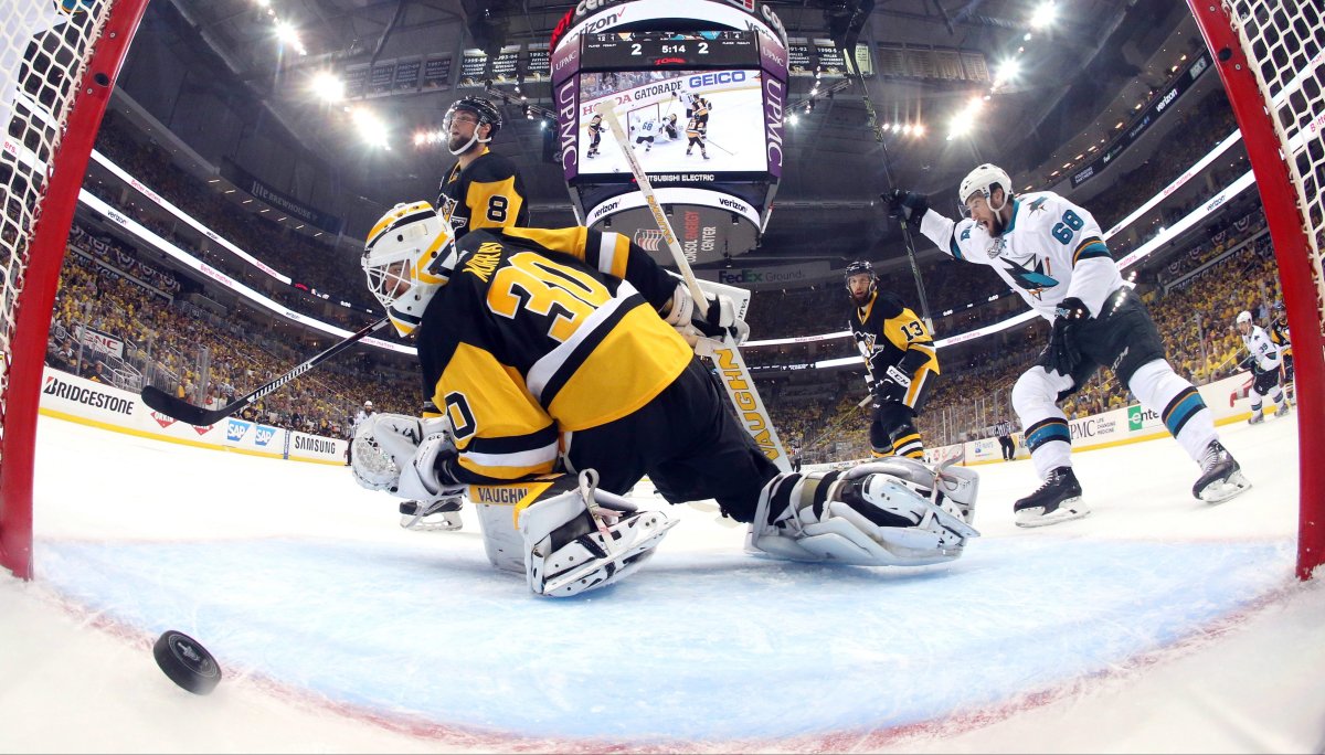 San Jose Sharks' Melker Karlsson, right, celebrates his goal against Pittsburgh Penguins goalie Matt Murray (30) during the first period in Game 5 of the NHL hockey Stanley Cup Finals on Thursday, June 9, 2016, in Pittsburgh. 