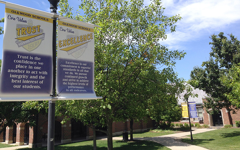 Signage hangs near Oakwood High School in Oakwood, Ohio Thursday June 9, 2016.   