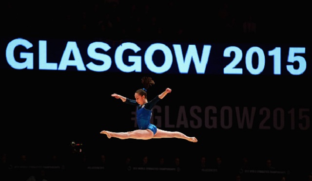 Isabela Onyshko competes in the beam event of the 2015 World Artistic Gymnastics Championships in Glasgow, Scotland.