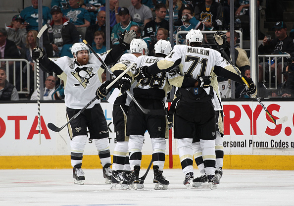 Phil Kessel #81, Patric Hornqvist #72, Kris Letang #58 and Evgeni Malkin #71 of the Pittsburgh Penguins celebrate Malkin's second period goal against the San Jose Sharks during Game Four of 2016 NHL Stanley Cup Final at SAP Center on June 6, 2016 in San Jose, California. (Photo by Dave Sandford/NHLI via Getty Images).