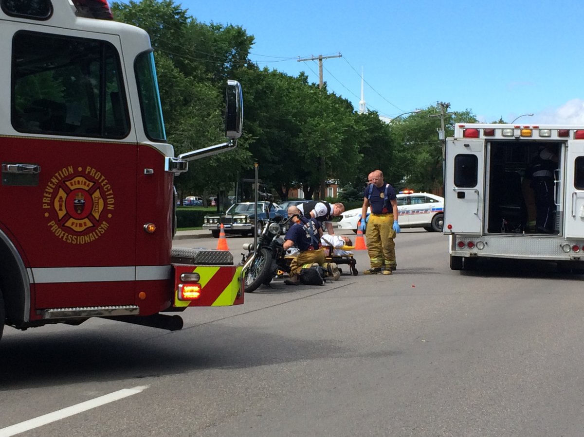 A 29-year-old woman has sustained non-life threatening injuries after her motorcycle collided with a minivan.