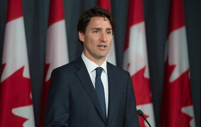 Prime Minister Justin Trudeau speaks with reporters as he takes part in a news conference to mark the end of the parliamentary session Wednesday June 22, 2016 in Ottawa.