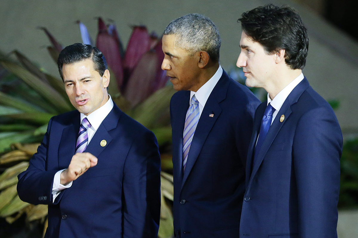 Mexican President Enrique Pena Nieto, left, gestures as he talks with U.S. President Barack Obama and Canadian Prime Minister Justin Trudeau are meeting this week.