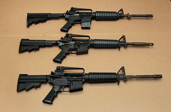 In this Aug. 15, 2012 file photo, three variations of the AR-15 assault rifle are displayed at the California Department of Justice in Sacramento, Calif. 