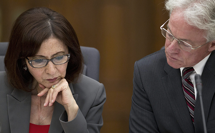 Information and Privacy Commissioner Brian Beamish is seen with former commissioner Ann Cavoukian during questioning at a legislative committee probing the gas plant scandal June 25, 2013 in Toronto. 