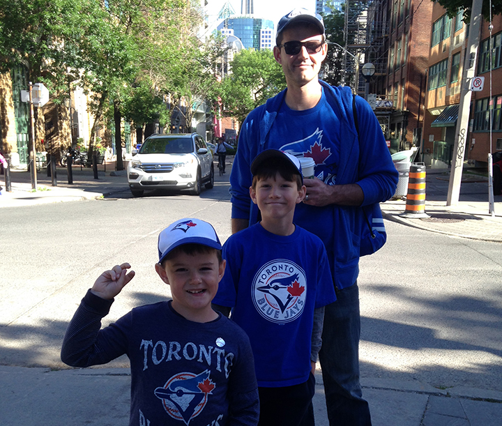 Brian McKechnie and his two boys after a Blue Jays game.
