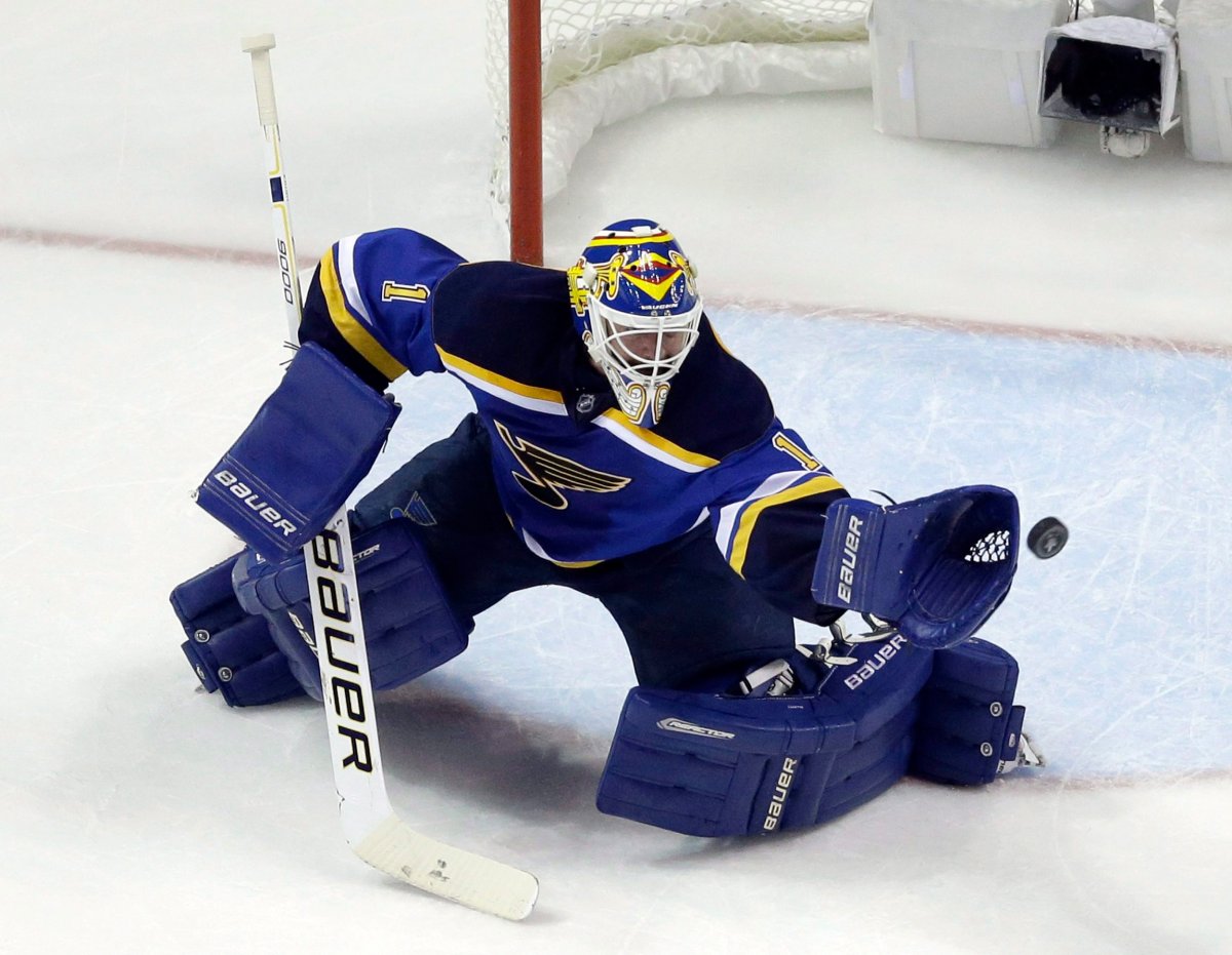 St. Louis Blues goalie Brian Elliott (1) makes the save during the second period in Game 2 of the NHL hockey Stanley Cup Western Conference finals against the San Jose Sharks, Tuesday, May 17, 2016, in St. Louis. (AP Photo/Jeff Roberson).