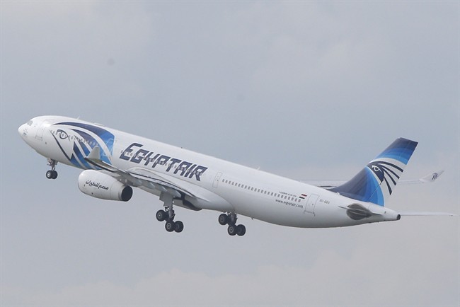 FILE - In this May 19, 2016 file photo, an EgyptAir Airbus A330-300 takes off for Cairo from Charles de Gaulle Airport outside of Paris. Egyptians officials say a bomb threat has forced an EgyptAir airliner en route to Beijing from Cairo to make an emergency landing in Uzbekistan, where the aircraft is being searched. (AP Photo/Christophe Ena, File).