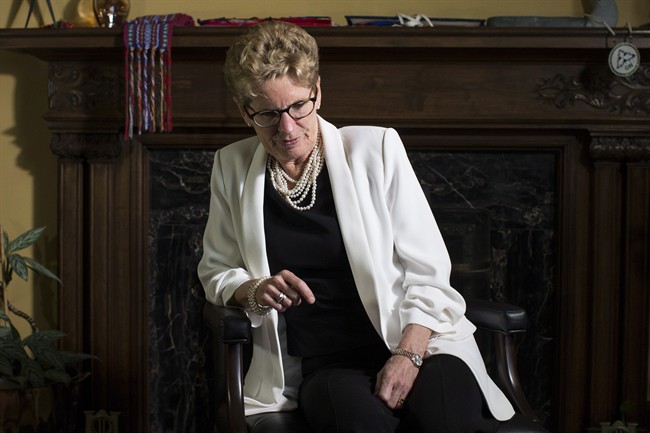 Ontario Premier Kathleen Wynne is photographed in her office in the Queens Park Legislature in Toronto on Thursday, June 9, 2016.