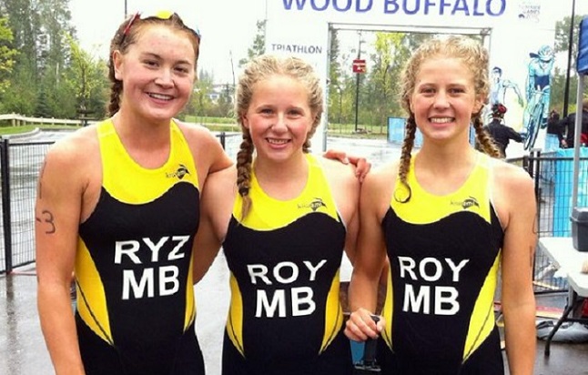 Payton Ryz and Kyla Roy pose with Caitie Roy after winning gold in the women's triathlon relay race at the 2015 Western Canada Games in Wood Buffalo, Alberta.