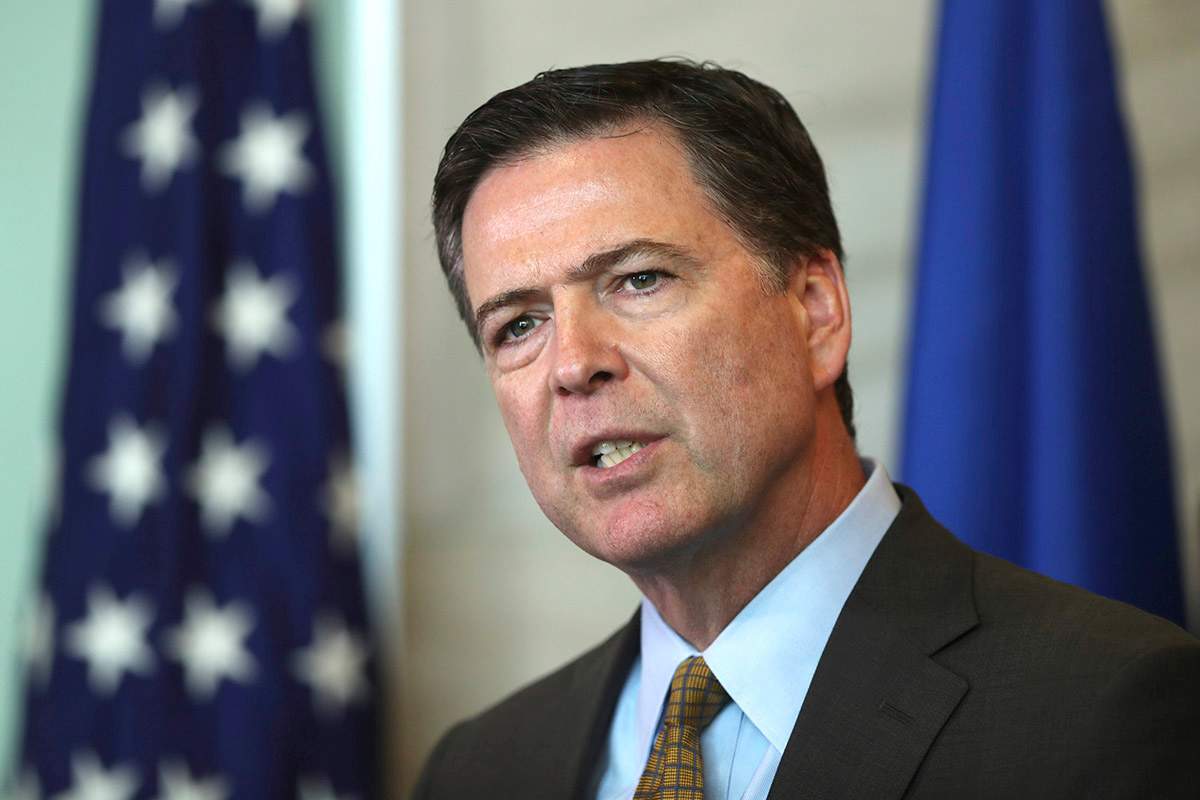 FBI Director James Comey speaks during a news conference Tuesday afternoon June 7, 2016, in Minneapolis, Minn., while in town as part of a two-day regional visit.