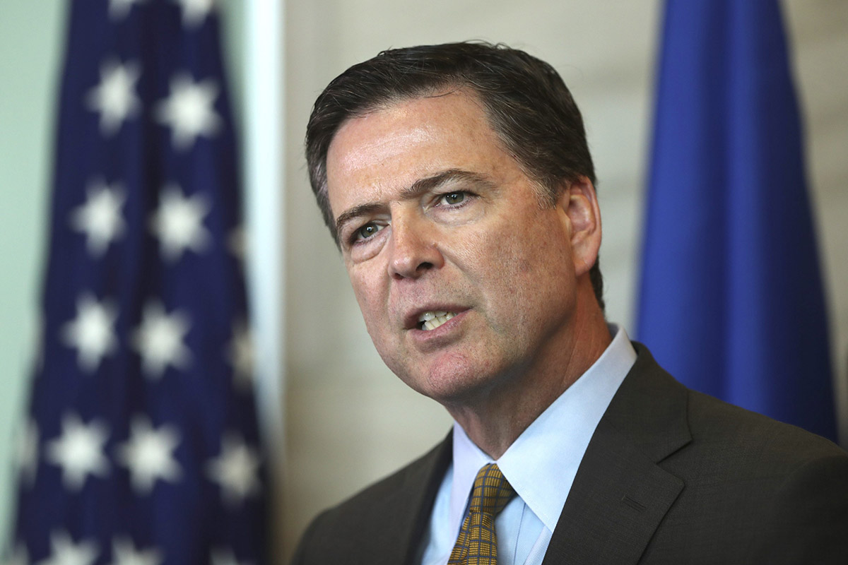 FBI Director James Comey speaks during a news conference Tuesday afternoon June 7, 2016, in Minneapolis, Minn., while in town as part of a two-day regional visit.