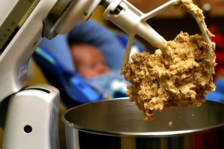 In this undated file photo, cookie dough clings to the beaters of a standing mixer.