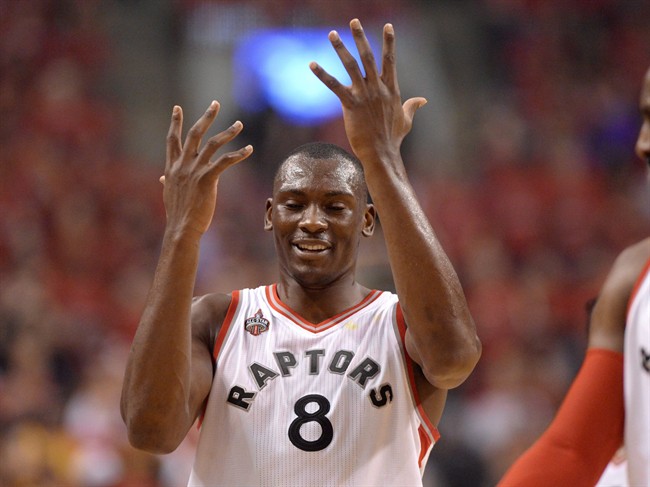 Toronto Raptors centre-forward Bismack Biyombo reacts after being called on a foul against the Cleveland Cavaliers during first half Eastern Conference final NBA playoff basketball action in Toronto on May 27, 2016.