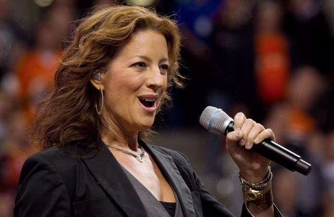 Canadian singer Sarah McLachlan sings the national anthem at B.C. Place stadium in Vancouver, B.C., on September 30, 2011. 