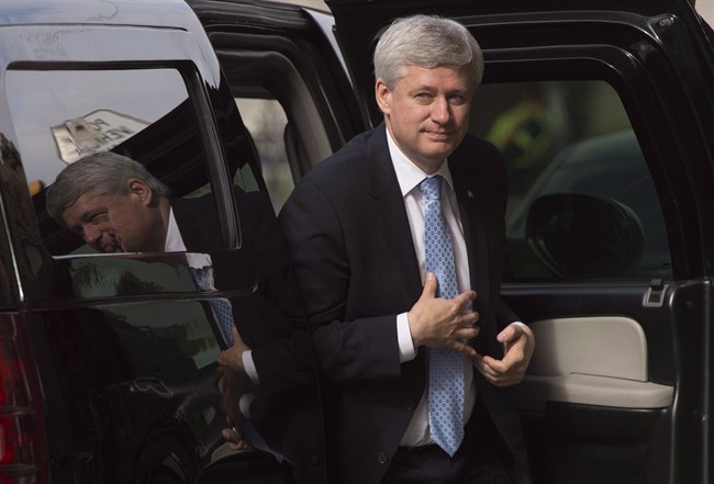 Outgoing Prime Minister Stephen Harper arrives at his Langevin office in Ottawa, Wednesday Oct. 21, 2015. 