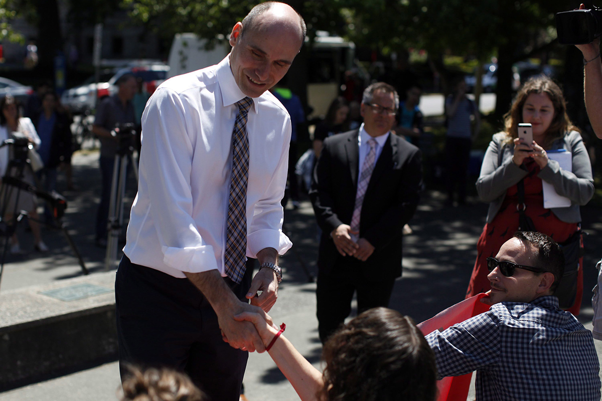 Jean-Yves Duclos, Minister of Families, Children and Social Development, meets with housing and homeless advocates, activists, and residents from tent city and other supporters at the Hotel Grand Pacific during a protest in Victoria, B.C., Tuesday, June 28, 2016.