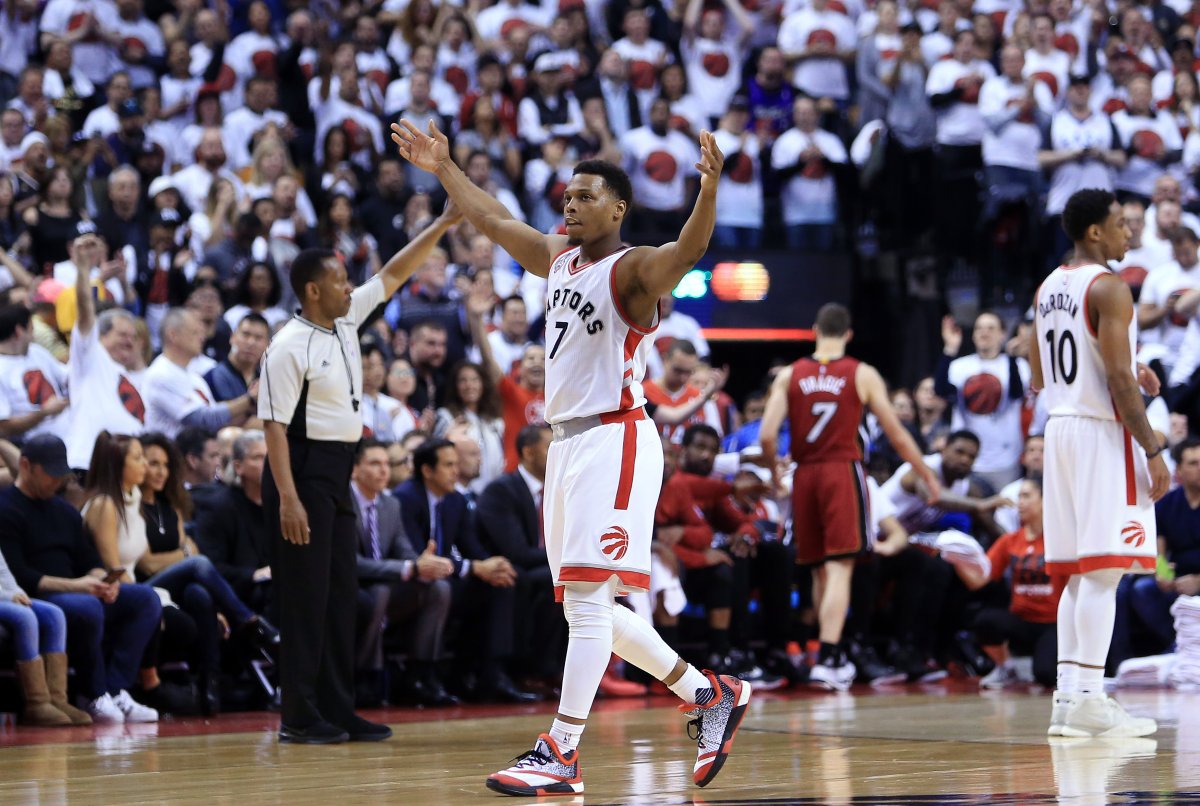 Kyle Lowry celebrates late in the second half of Game Seven of the Eastern Conference Quarterfinals against the Miami Heat during the 2016 NBA Playoffs at the Air Canada Centre on May 15, 2016 in Toronto, Ontario, Canada.