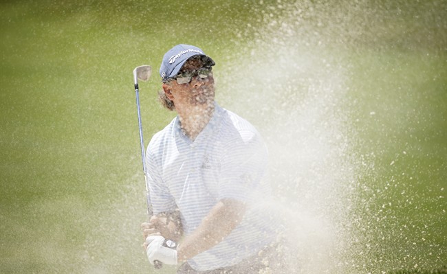 Scott McCarron hits out of a bunker onto the ninth green during the final round of the PGA Tour Champions Principal Charity Classic golf tournament, Sunday, June 5, 2016,.