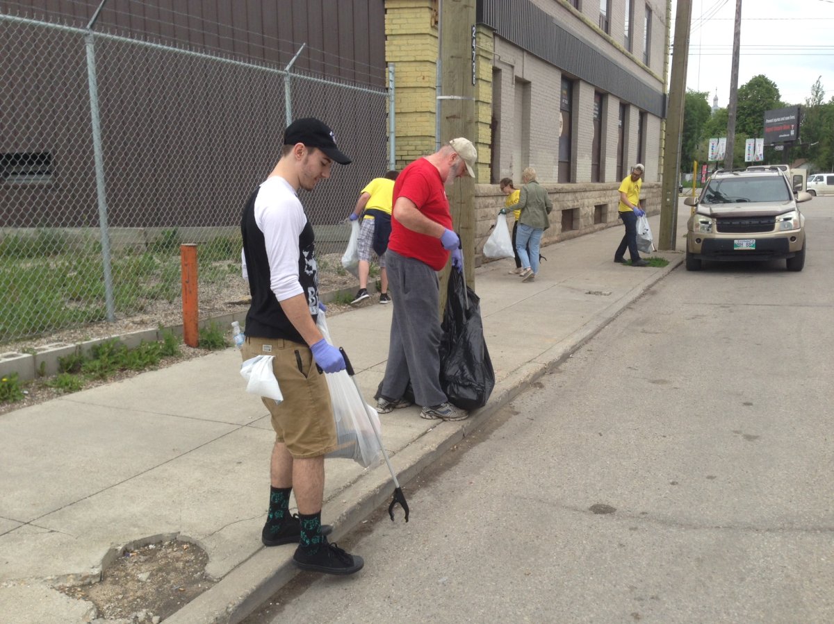 Volunteers helped clean up the North End for a second day.