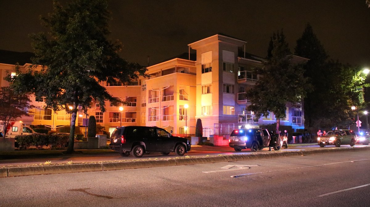 Four people were sent to hospital after a fight broke out at a Surrey apartment.