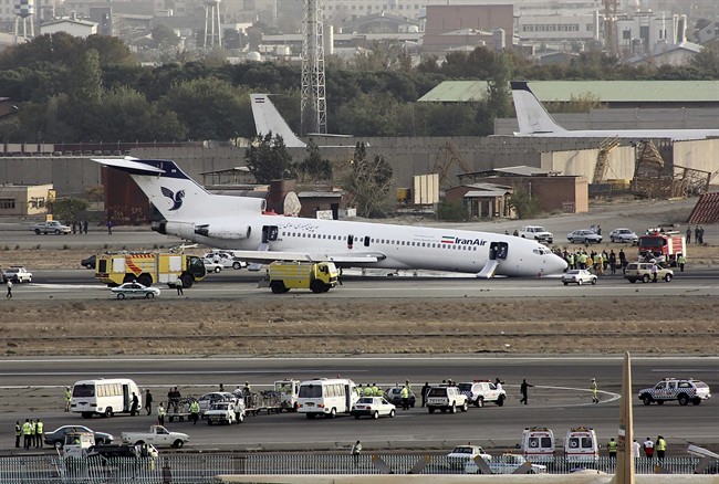 In this Tuesday, Oct. 18, 2011 FILE photo, an Iran Air Boeing 727 landed on its nose, after the landing gear jammed, at the Mehrabad airport in Tehran, Iran. Boeing Co. is negotiating a deal to sell 100 airplanes to Iran, state-run media reported Sunday, June 19, 2016 a sale potentially worth billions that would mark the first major entry of an American company into the Islamic Republic after last year's nuclear deal.