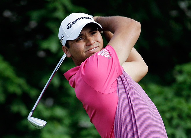 In this June 3, 2016, file photo, Jason Day tees off on the 14th hole during the second round of the Memorial golf tournament in Dublin, Ohio. 