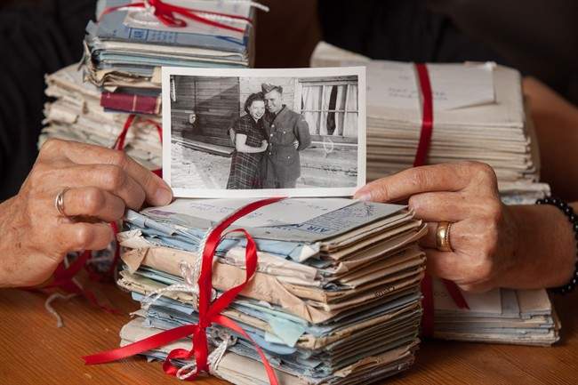 Cathy Gaetz-Brothen of Vernon, B.C. holds a picture of her parents Joseph Jacob Gaetz who served in the Canadian Military during the Second World War with his then fiancee Jean McRae who later became his wife, in Vernon, B.C. on Thursday, June 16, 2016. Gaetz wrote some 587 letters from July 8, 1943 to November 22, 1945 to wife during his time in the Canadian military. The letters were a detailed account of his life from front line during the war. 