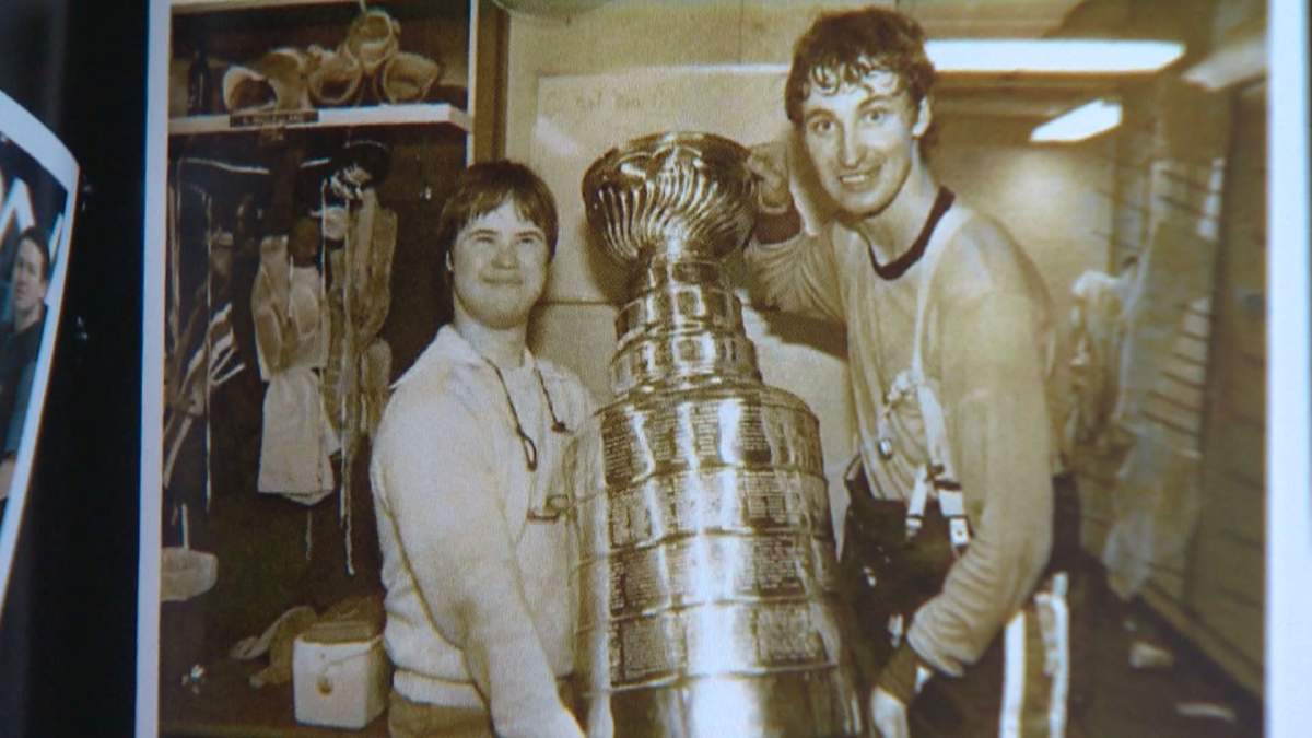 Joey Moss with Wayne Gretzky and the Stanley Cup.