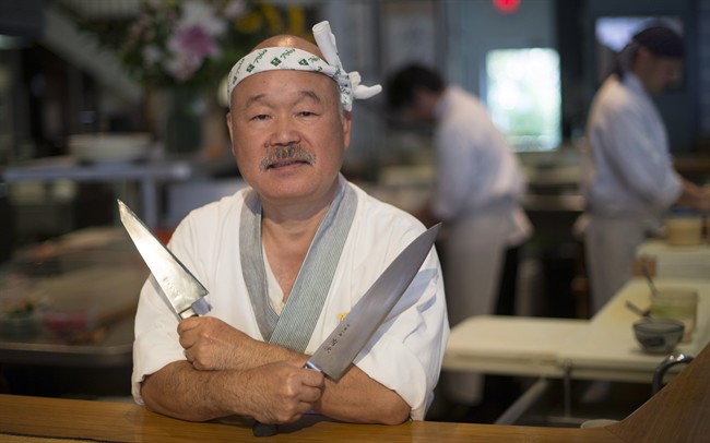 World famous sushi chef Tojo poses for a photo in his restaurant in Vancouver, B.C., Tuesday, June, 14, 2016. 