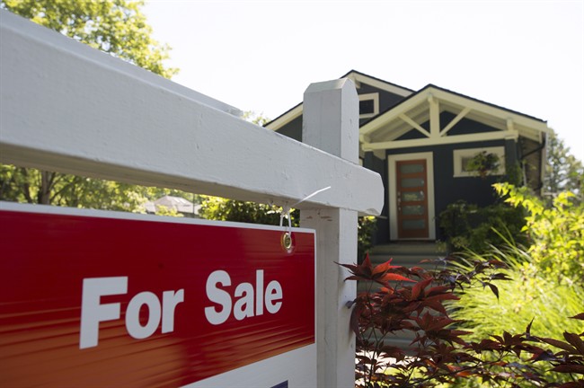 FILE PHOTO: A sold sign is pictured outside a home in Vancouver, B.C., Tuesday, June, 28, 2016.