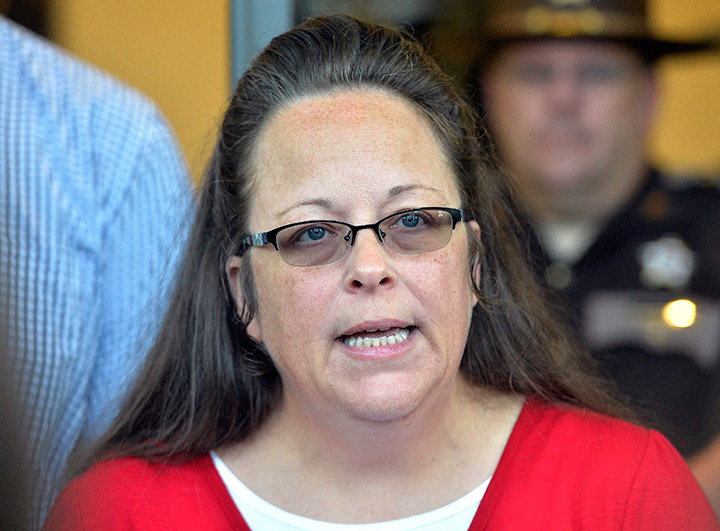 In this Sept. 14, 2015 file photo, Rowan County Clerk Kim Davis makes a statement to the media at the front door of the Rowan County Judicial Center in Morehead, Ky. 
