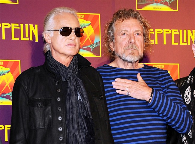 In this Oct. 9, 2012 file photo, Led Zeppelin guitarist Jimmy Page, left, and singer Robert Plant appear at a press conference ahead of the worldwide theatrical release of "Celebration Day," a concert film of their 2007 London O2 arena reunion show, in New York.