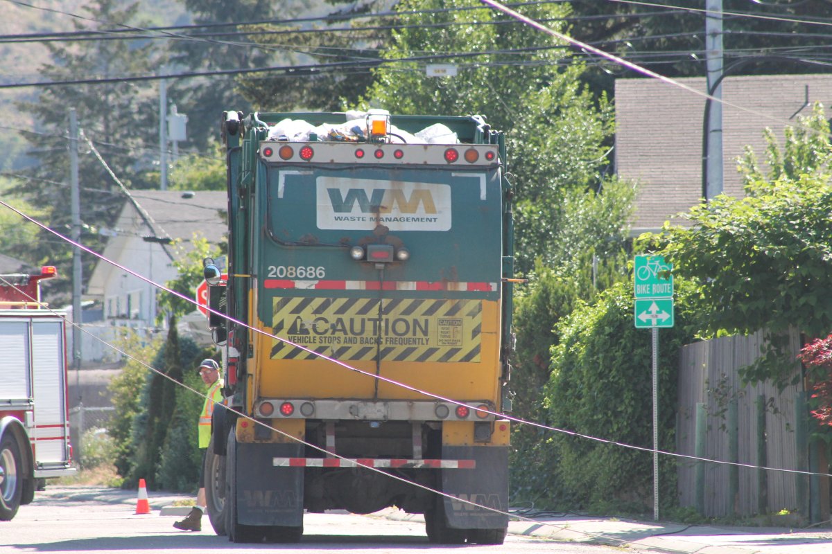 A garbage truck with its forks lifted accidentally brought down Shaw and Telus lines on Forestbrook Drive in Penticton on Saturday morning. 