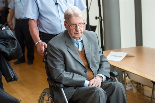 FILE- In this Saturday June 11, 2016 file photo, 94-year-old former SS guard at the Auschwitz death camp Reinhold Hanning, arrives at a courtroom in Detmold, Germany.