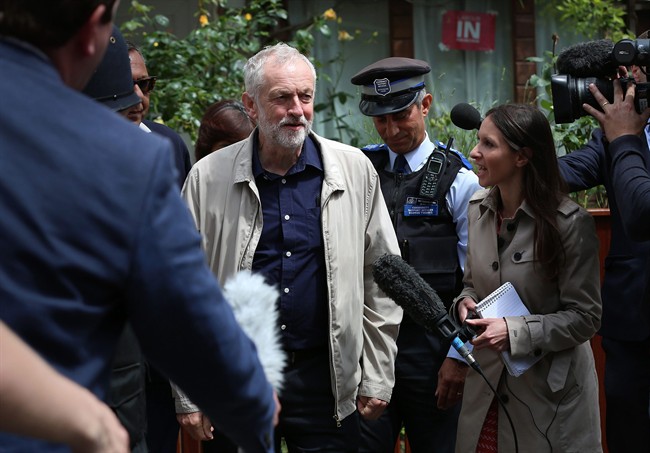 Labour party leader Jeremy Corbyn faces the media as he leaves his house in London, Sunday June 26, 2016. 