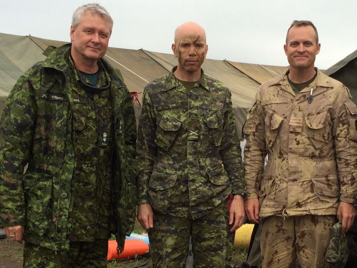 Global Edmonton’s Gord Steinke (L) with Brig. Gen Wayne Eyre (C).