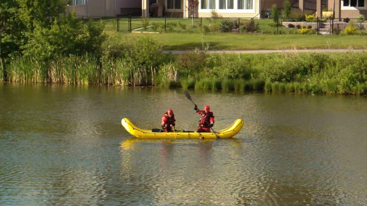 Vehicle crashes into McKenzie Towne pond, driver flees on foot - image