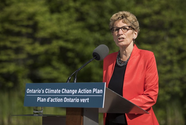 Ontario Premier Kathleen Wynne speaks as she makes a climate change policy announcement at Evergreen Brickworks in Toronto, Wednesday June 8, 2016.
