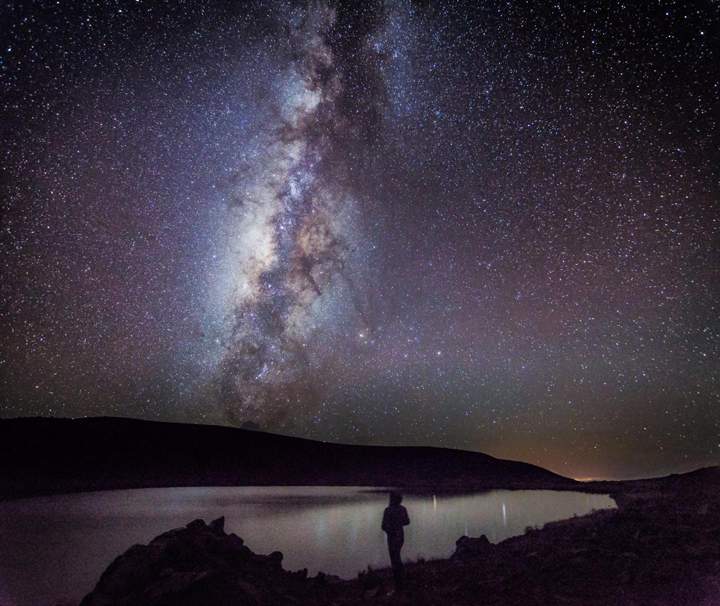 The Milky Way and Galactic Center rise over Lake Waiau on the summit of Mauna Kea.