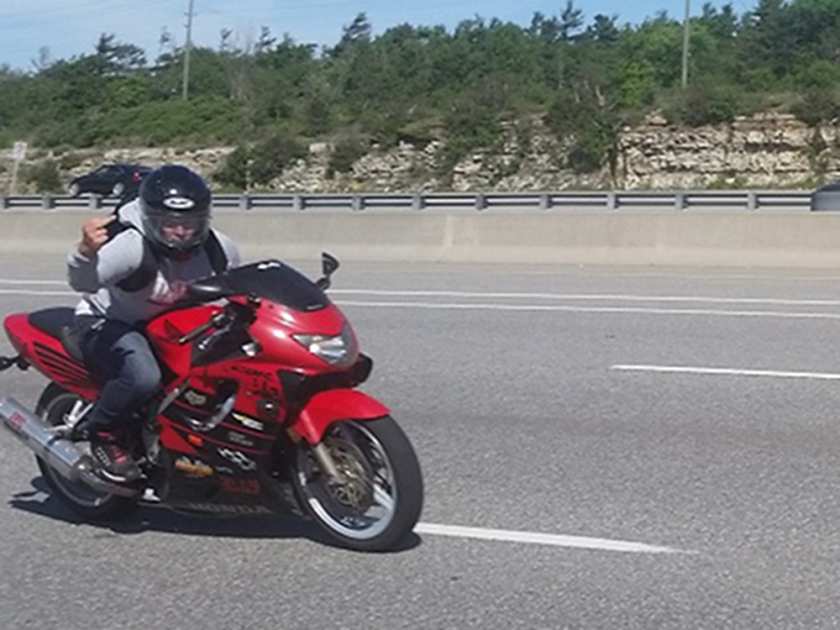 Ottawa police are searching for this motorcyclist, who has been driving erratically on local highways and allegedly pointing a handgun at other motorists.