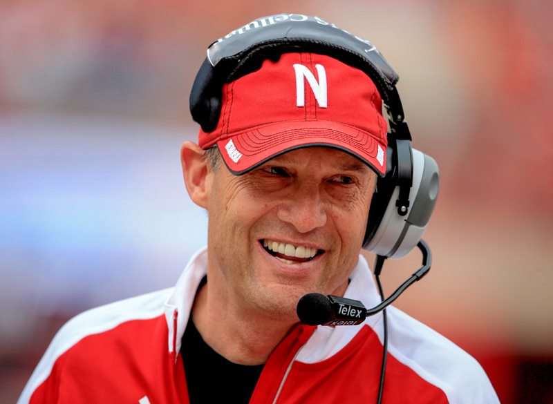 Nebraska head coach Mike Riley speaks on his head set during the Red White spring NCAA college football in Lincoln, Neb., Saturday, April 16, 2016. 