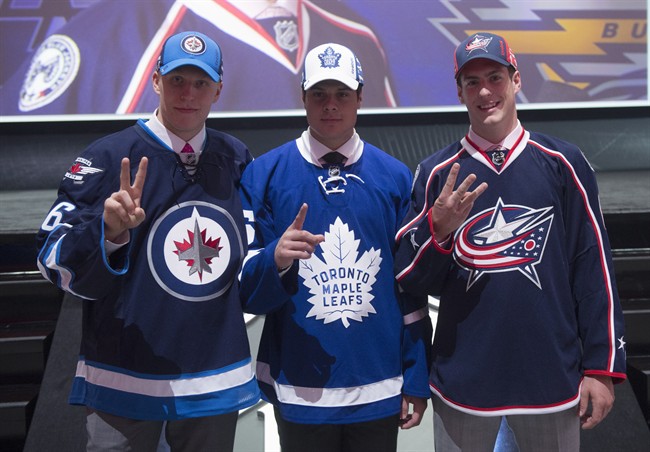 Winnipeg Jets add 2 defensemen, a forward and a goalie on day two of NHL Draft - image