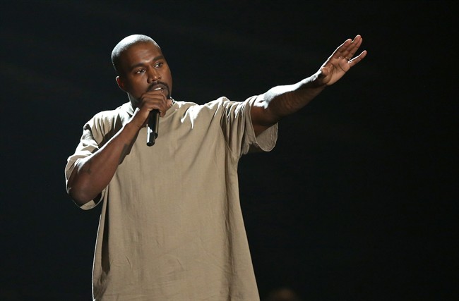 FILE - In this Sunday, Aug. 30, 2015, file photo, Kanye West accepts the video vanguard award at the MTV Video Music Awards at the Microsoft Theater in Los Angeles. The organizers of the Governors Ball said events scheduled to include West and Death Cab for Cutie on Sunday, June 5, 2016, weren't going to be held "due to severe weather and a high likelihood of lightning in the area." (Photo by Matt Sayles/Invision/AP, File).