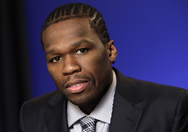 FILE - In this Oct. 26, 2011 file photo, Rapper and businessman Curtis Jackson III, known as 50 Cent, poses during an interview in New York. Police in St. Kitts and Nevis say that U.S. rapper 50 Cent and a member of his entourage were detained and charged for allegedly using  indecent language during his performance at the St. Kitts Music Festival, Saturday, June 25, 2016.
