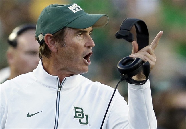  In this Sept. 12, 2015, file photo, Baylor coach Art Briles yells from the sideline during the first half of an NCAA college football game against Lamar in Waco.