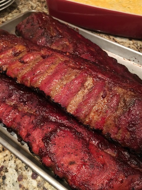 The best way to test smoked ribs for doneness is to make sure that the meat has receded from the end of the bones and that you can bend the rack without breaking it in pieces. 
