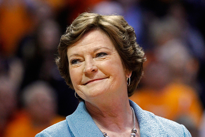 In this Jan. 28, 2013, file photo, former Tennessee women's basketball coach Pat Summitt smiles as a banner is raised in her honour before the team's NCAA college basketball game against Notre Dame in Knoxville, Tenn. 